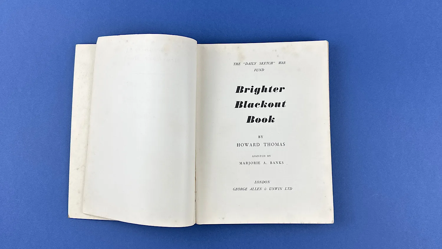WW2 Brighter Blackout Book (1939–1940) by Howard Thomas, original wartime edition with cloth strip spine and printed boards inside cover page