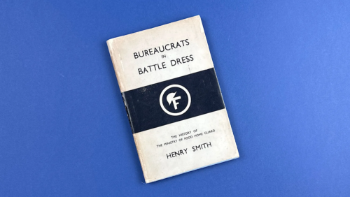 Front cover of Bureaucrats in Battledress by Henry Smith, showing wear to edges and the Ministry of Food Home Guard emblem
