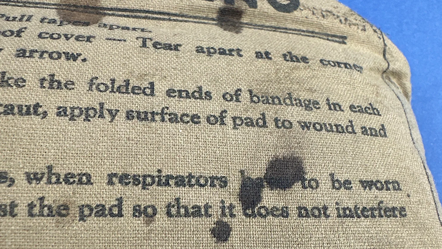 Detail view of printed usage instructions and light storage marks on the 1938 ARP Shell Dressing