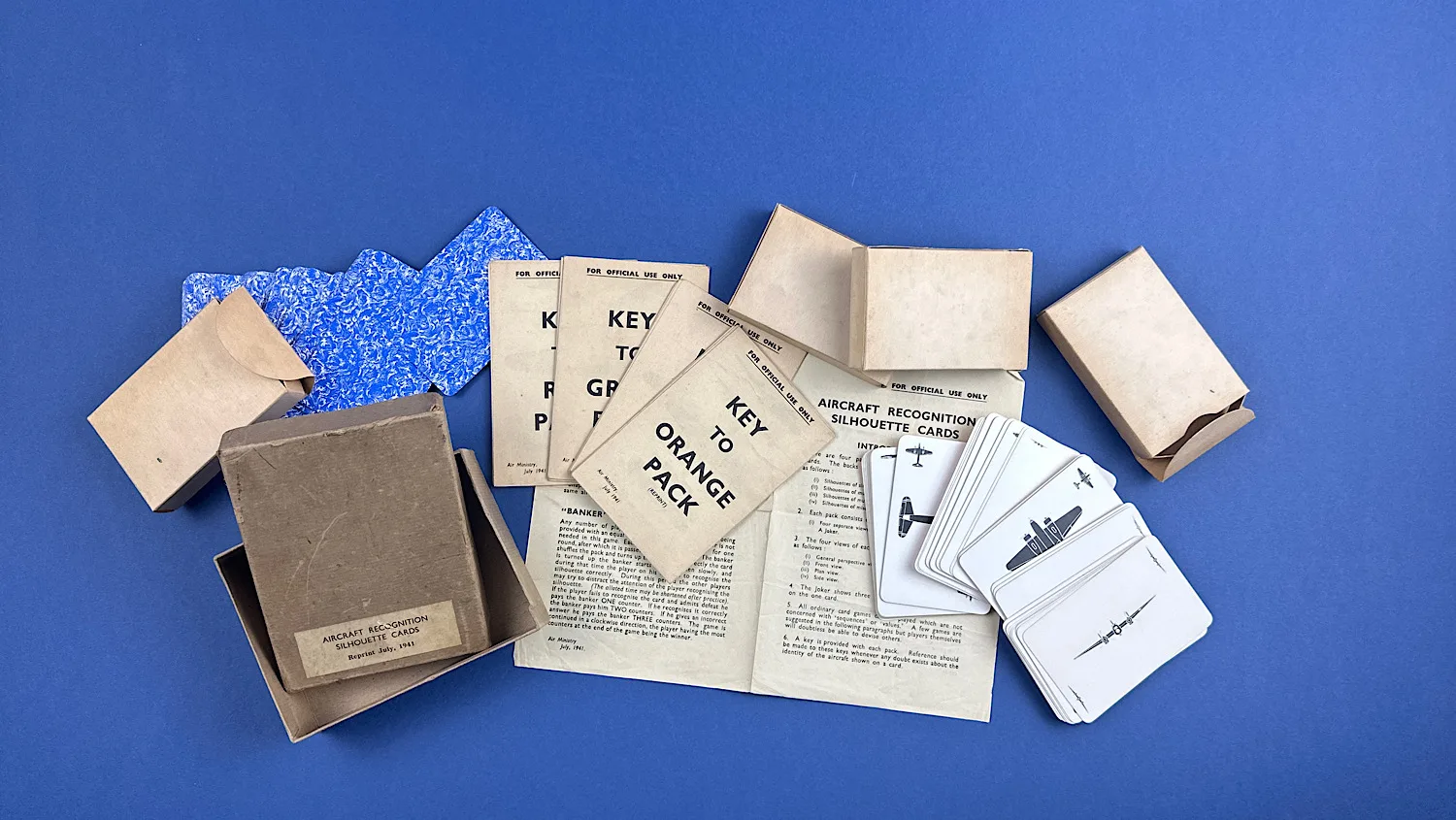 WW2 Aircraft Recognition Silhouette Card Set laid out with all four coloured decks, keys and instruction sheets