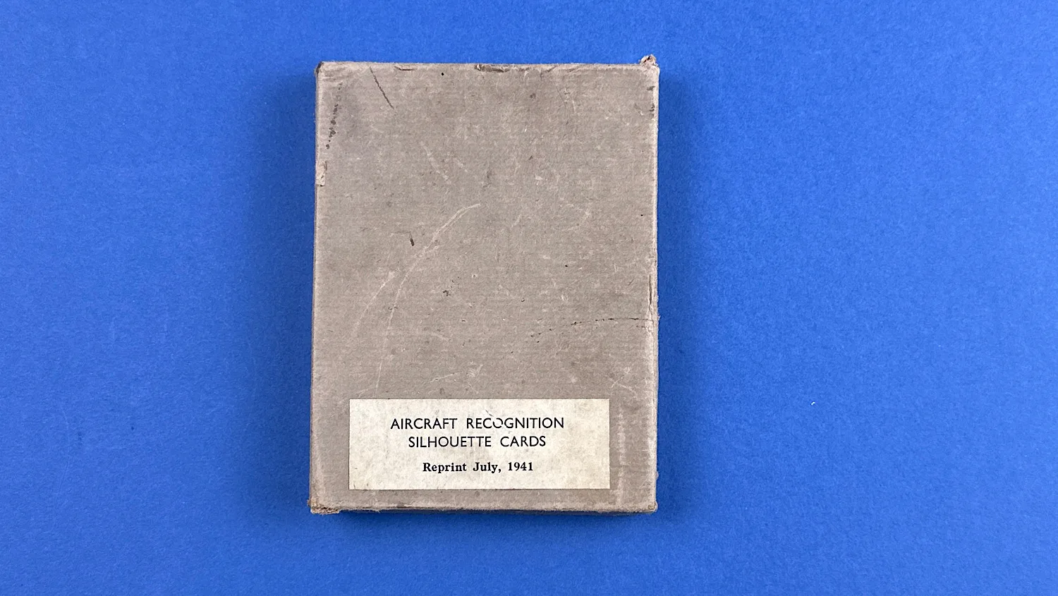Top of the original box for the Aircraft Recognition Silhouette Cards showing the printed Reprint July 1941 label