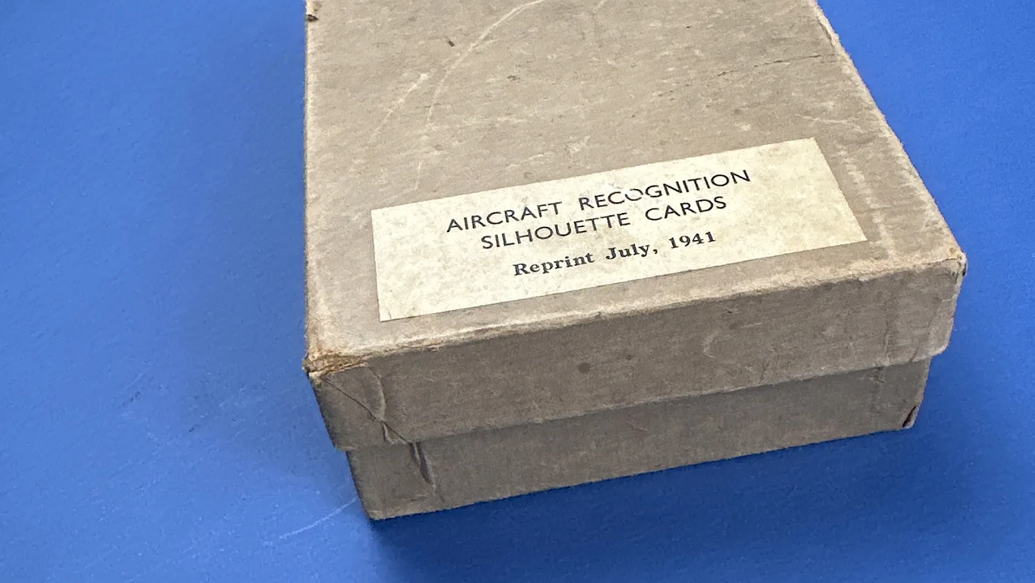 Angled view of the Aircraft Recognition Silhouette Cards box with the Reprint July 1941 label visible on the lid