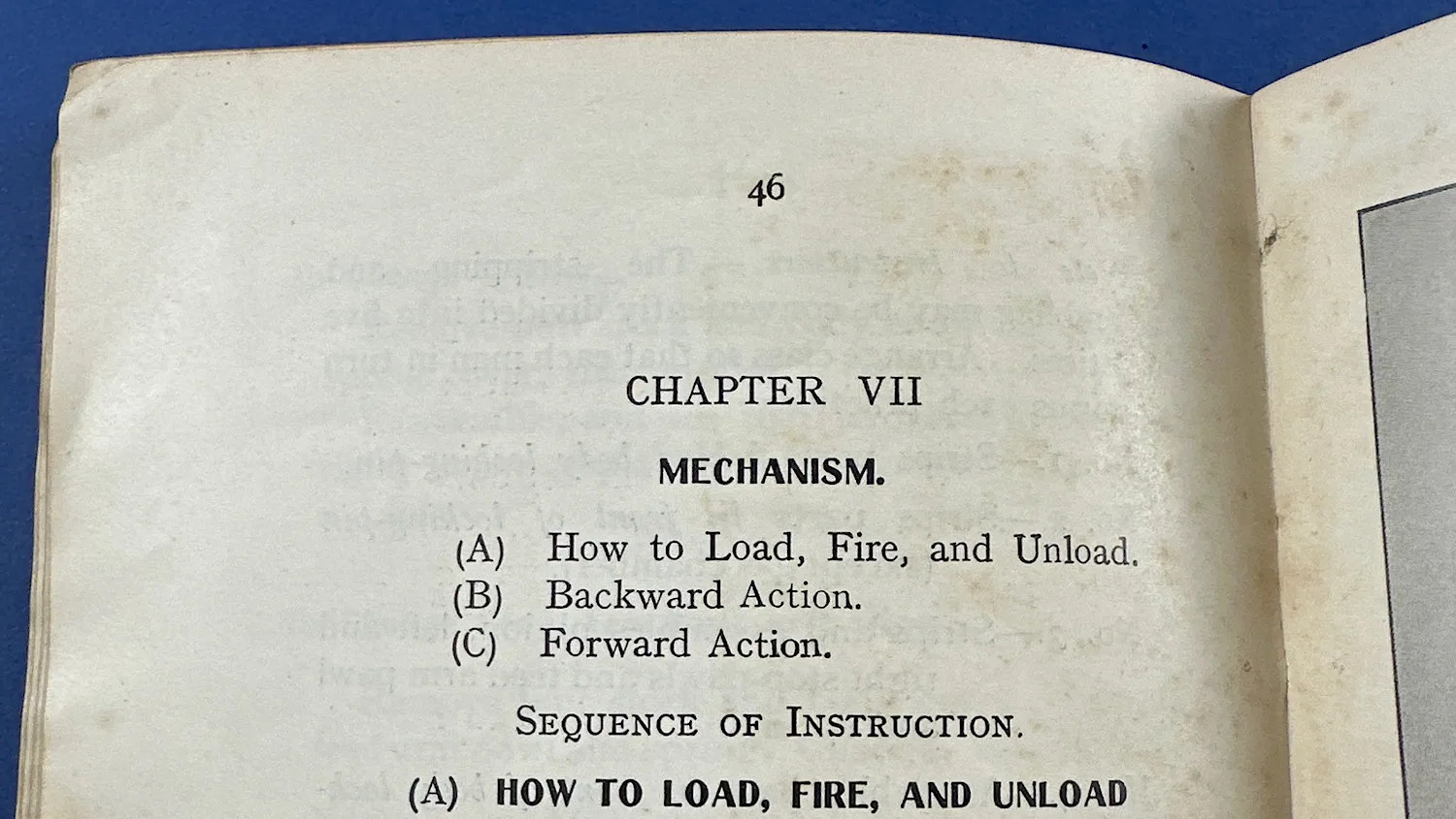 Close-up of Chapter VII mechanism heading and instructional text inside The Complete Lewis Gunner