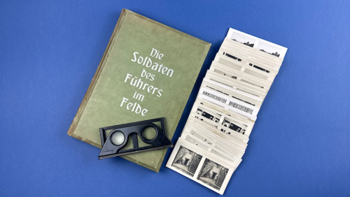 WWII German propaganda book Die Soldaten des Führers im Felde with original folding 3D viewer and full set of stereoscopic photographs laid out