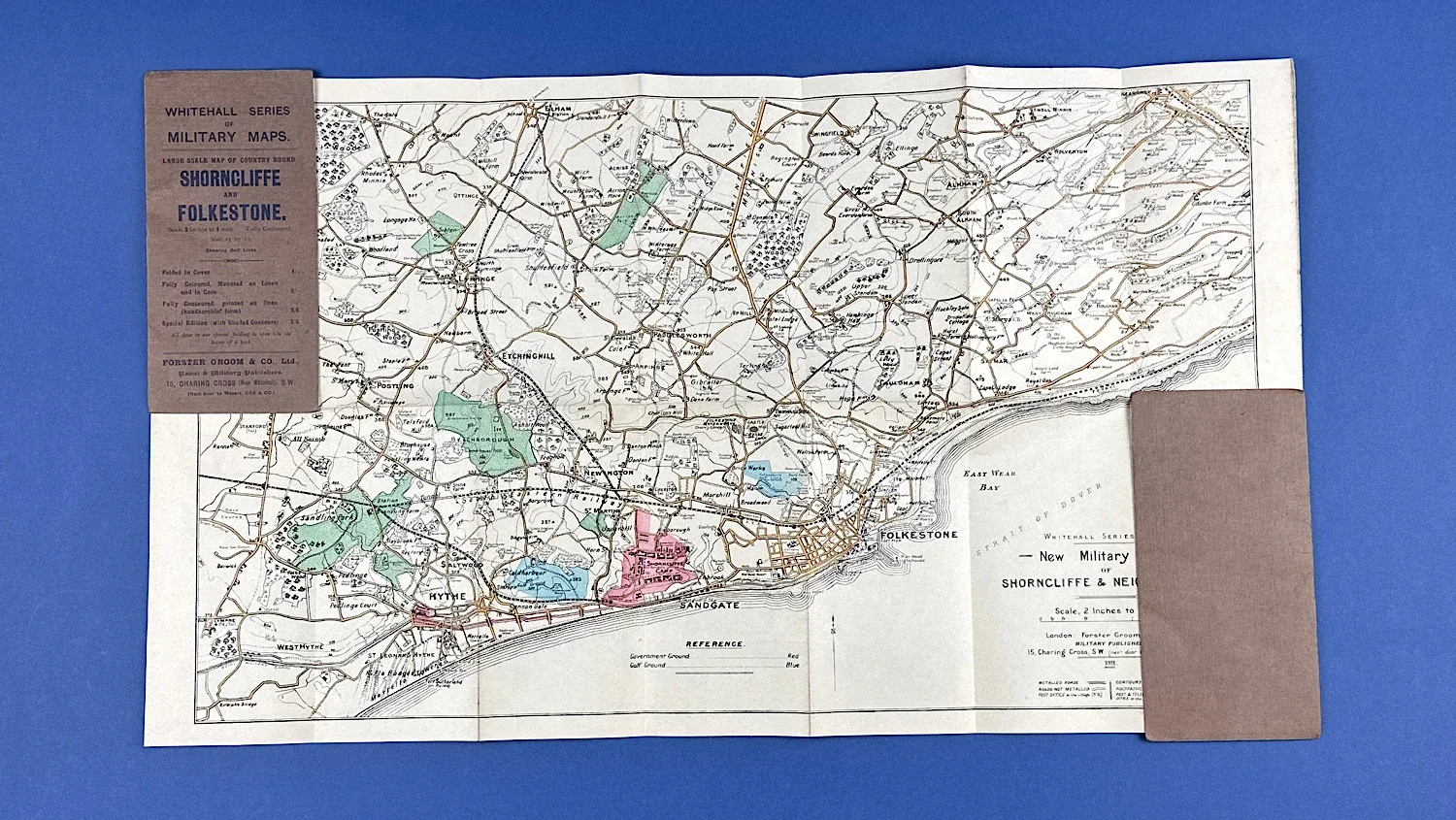 1911 British military map of Shorncliffe and Folkestone fully opened showing coloured terrain and road network with original Whitehall Series covers present