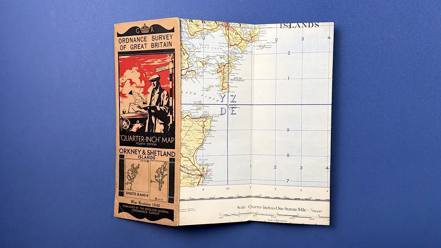 Partially unfolded WW2 Ordnance Survey quarter inch map showing Orkney and Shetland Islands with original cover attached