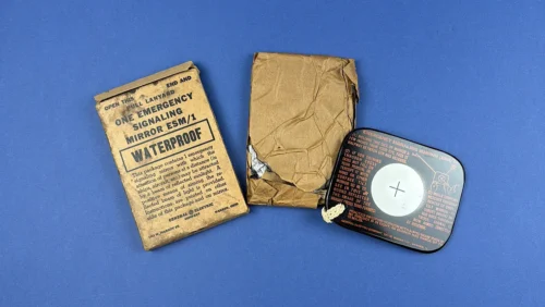 Original WW2 U.S. Emergency Signaling Mirror ESM/1 with waterproof packet lanyard and inner wrapping shown disassembled