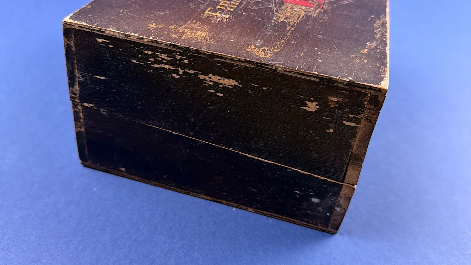 British Home Front Boots “Home” First Aid Case side view showing wooden construction and age related surface wear