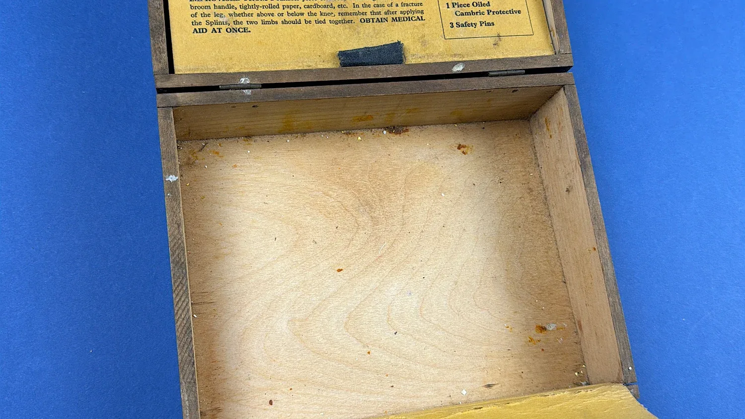 British Home Front Boots “Home” First Aid Case empty lower compartment showing original wooden interior and age related wear