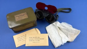 WW2 US Army 1944 Variable Density Goggles set with American Optical tin red Polaroid tracer visor envelopes and instruction sheet laid out together