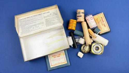 WW2 ARP first aid case opened showing box interior and original medical contents