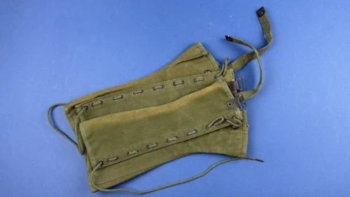Full length view of WW2 British Army gaiters pair showing laced fastening and overall shape