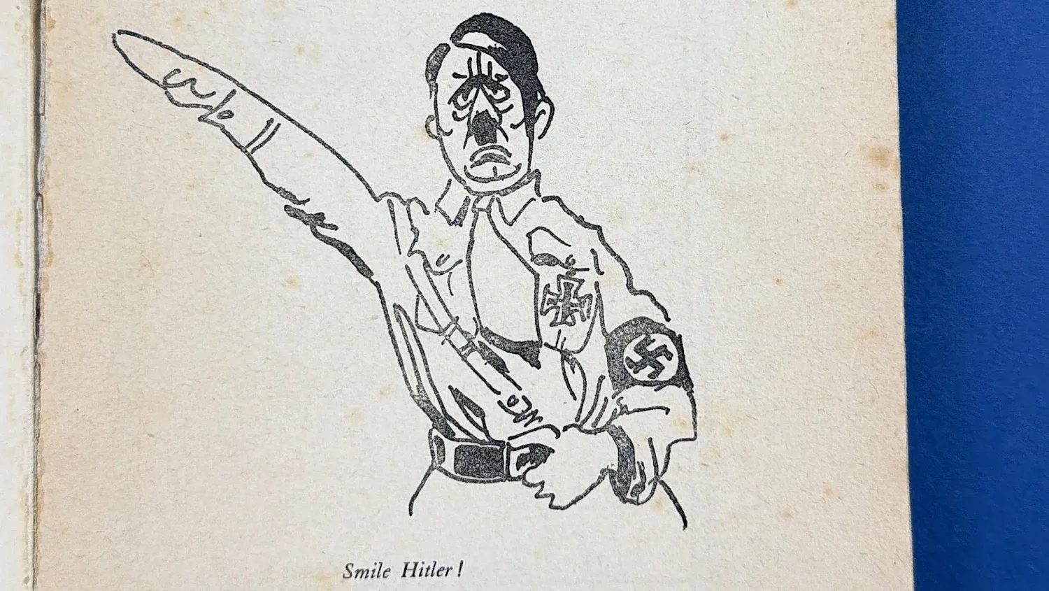 Close up of interior cartoon illustration of Hitler in Mein Rampf satirical booklet British WW2 anti Nazi humour
