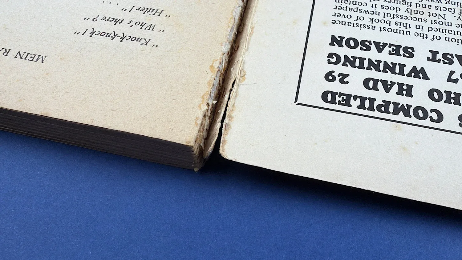 Close up of spine and binding showing wear and separation to WW2 Mein Rampf satirical booklet Home Front ephemera