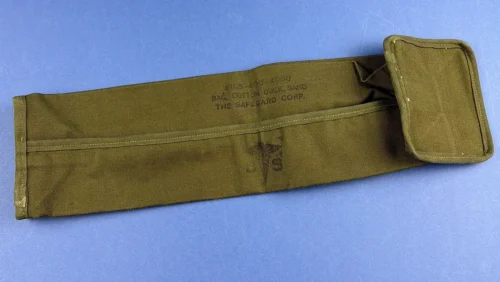 WW2 U.S. Army cotton duck sandbag with Safeguard Corp markings and US ordnance bomb stamp
