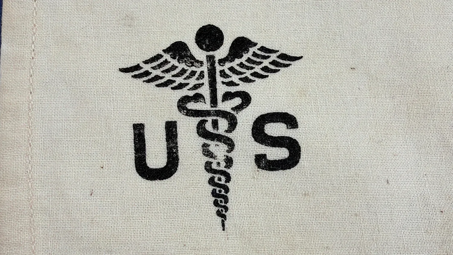 WW2 US Army medical caduceus emblem detail clearly printed on surgical drape cloth