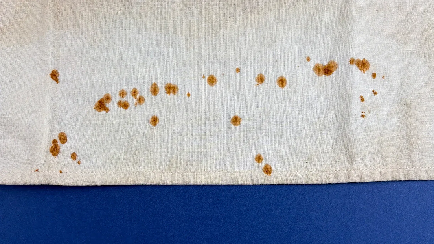 WW2 US Army surgical drape staining detail showing authentic period use and ageing