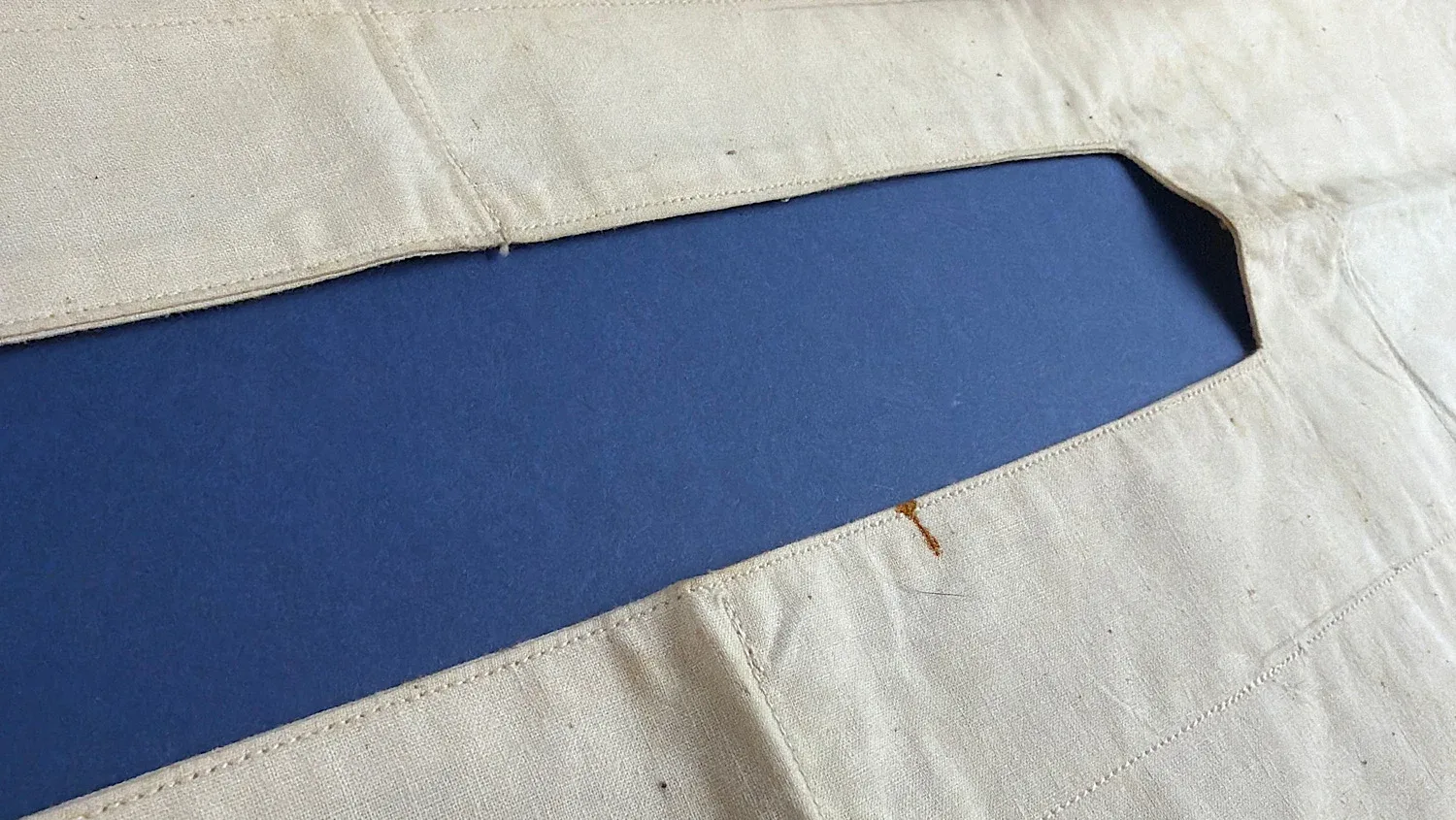 WW2 US medical surgical drape aperture corner detail with stitching and wear