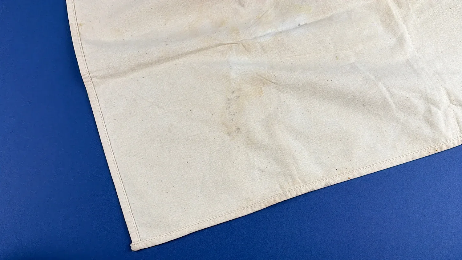 WW2 US Army surgical drape corner detail showing fabric condition and age wear