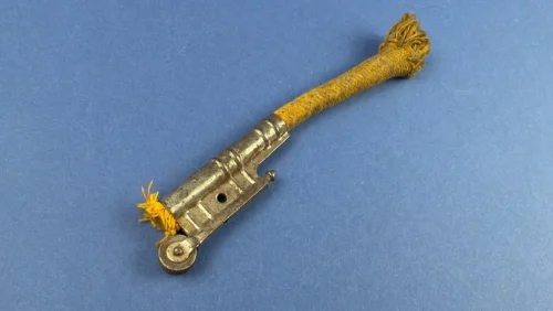 Vintage Bowers Army & Navy rope wick lighter full side view showing striker wheel and braided wick