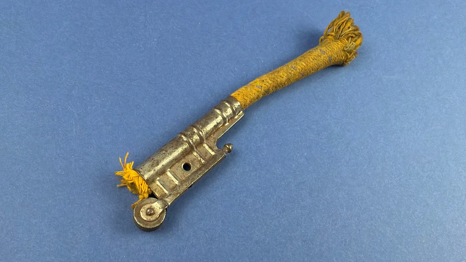 Vintage Bowers Army & Navy rope wick lighter full side view showing striker wheel and braided wick