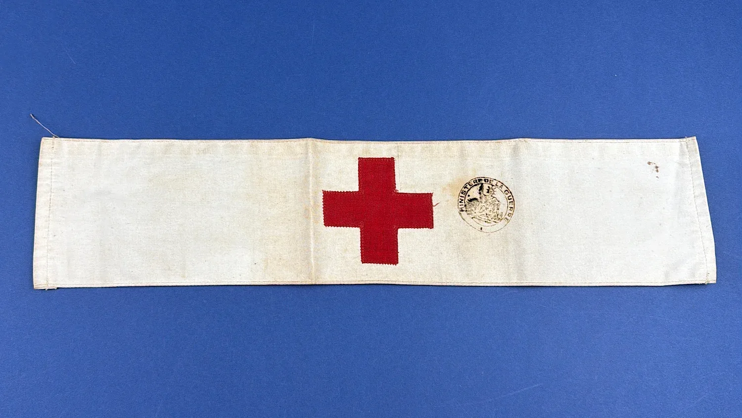 WW2 U.S. Army Medical Department Red Cross brassard armband full front view with applied red cross and circular stamp
