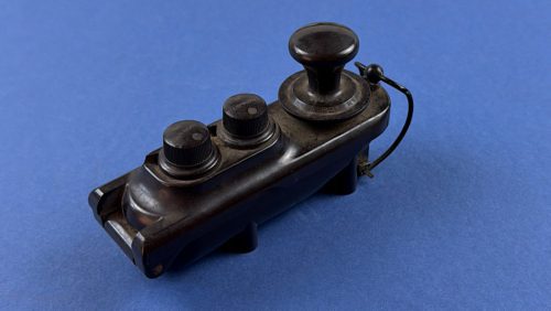 Original WW2 RAF Bathtub Morse key shown from an angled front view