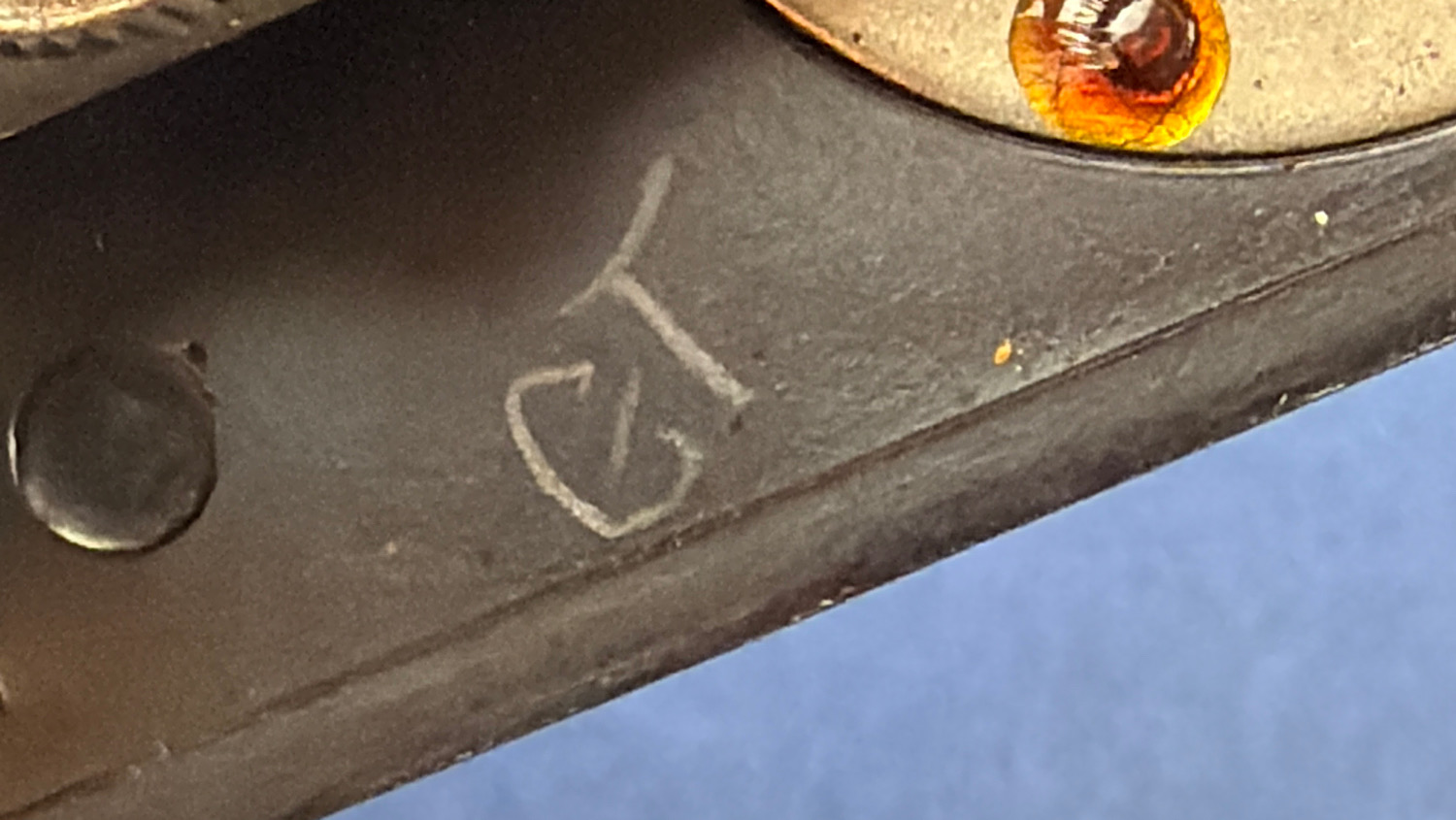 Close up of the GT marking inside the WW2 RAF Bathtub Morse key casing