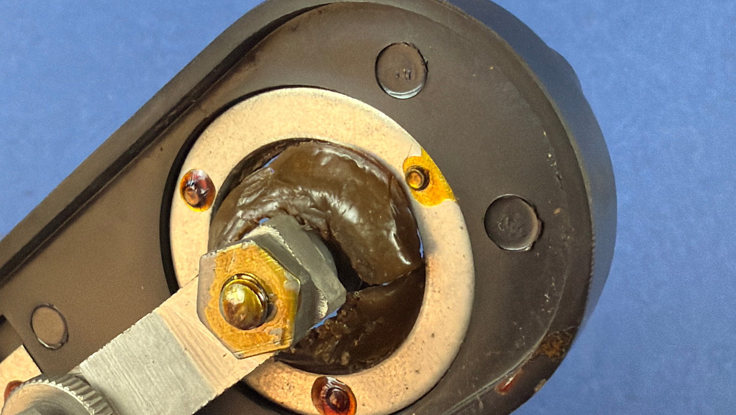 Close up of the perished rubber insulating compound around the internal contact area