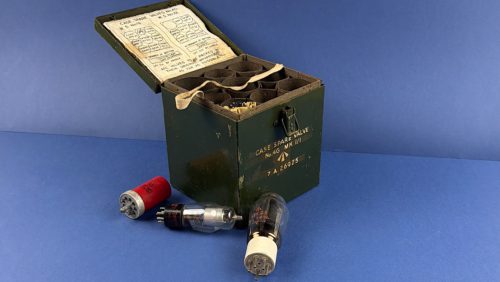 Wireless Set No.19 and No.22 spare valve case with assorted military radio valves displayed beside