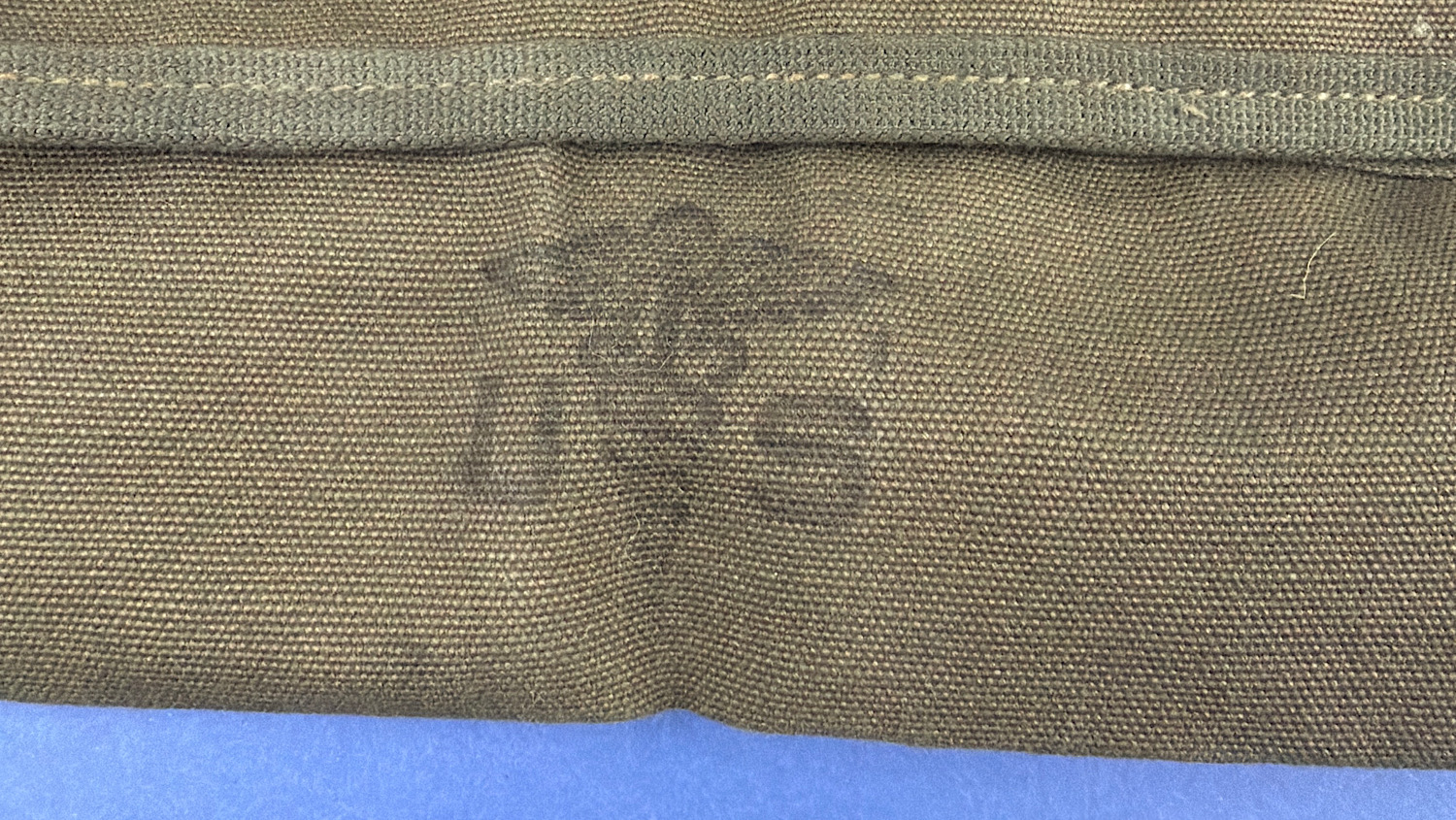 Close-up of original printed nomenclature on WW2 U.S. Army cotton duck sandbag