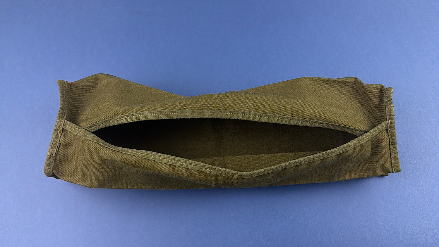 Open top view of WW2 U.S. Army cotton duck sandbag showing internal stitched compartments and clean interior