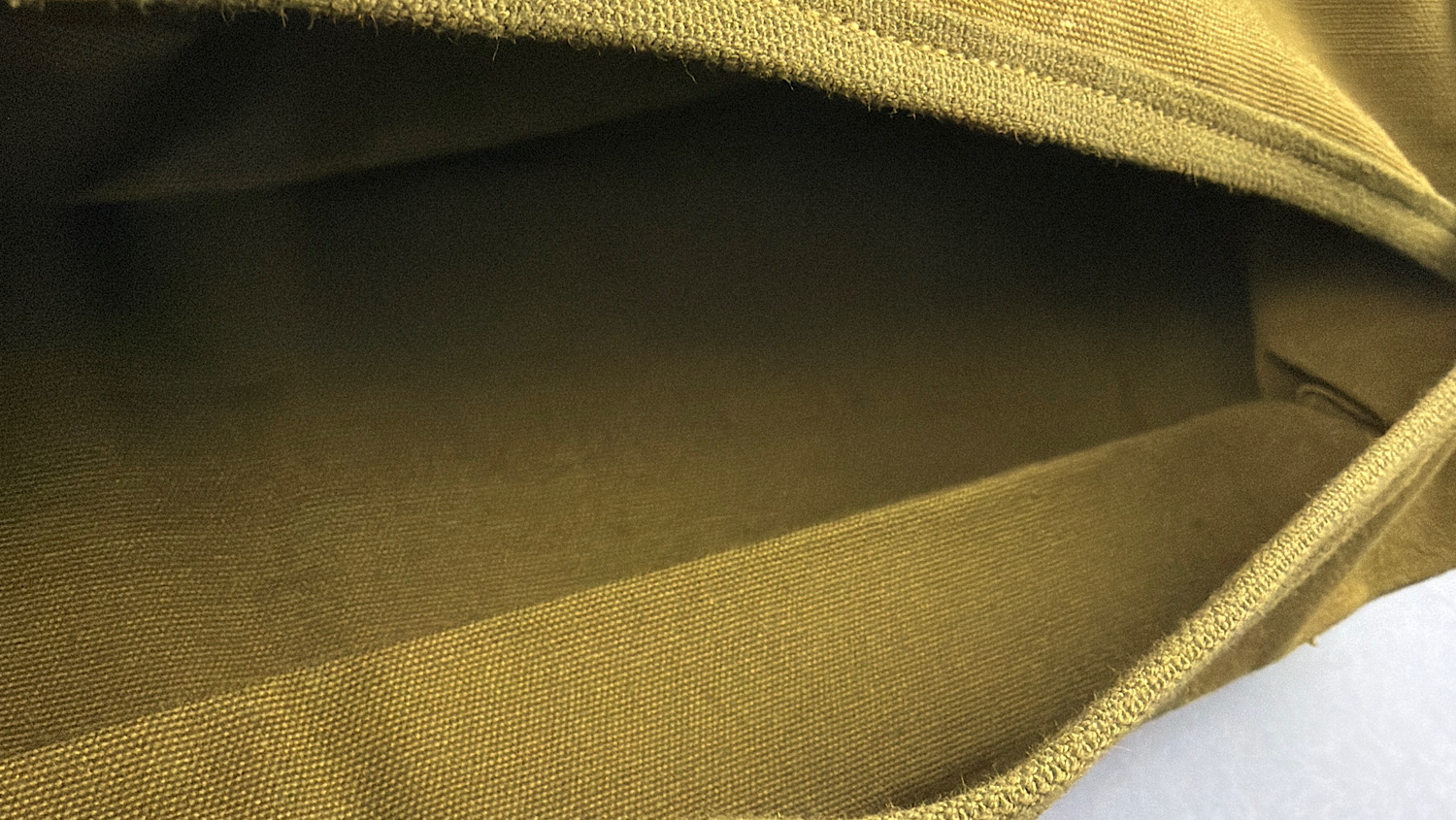 Internal stitched compartment inside original WW2 U.S. Army cotton duck sandbag