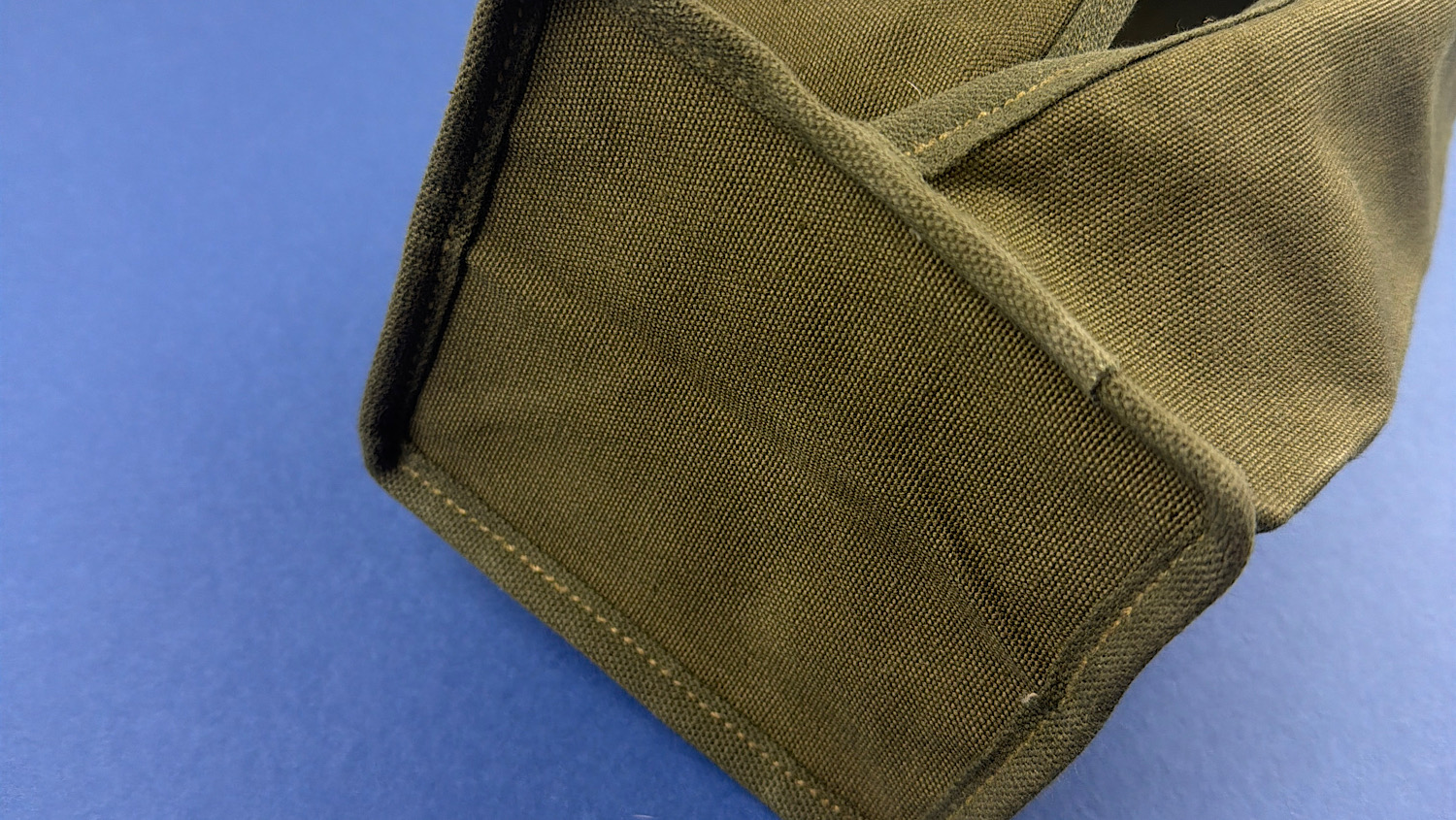 Close-up of reinforced end panel on WW2 U.S. Army canvas sandbag