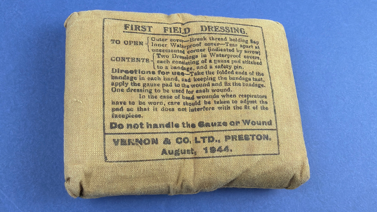 Original WW2 British Army First Field Dressing dated August 1944 by Vernon & Co Ltd Preston