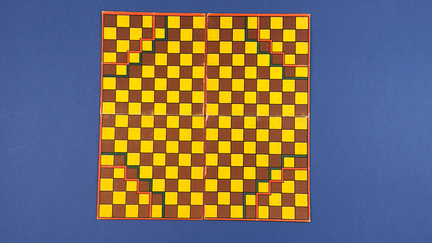 Original chequered Halma game board with coloured corner starting areas.