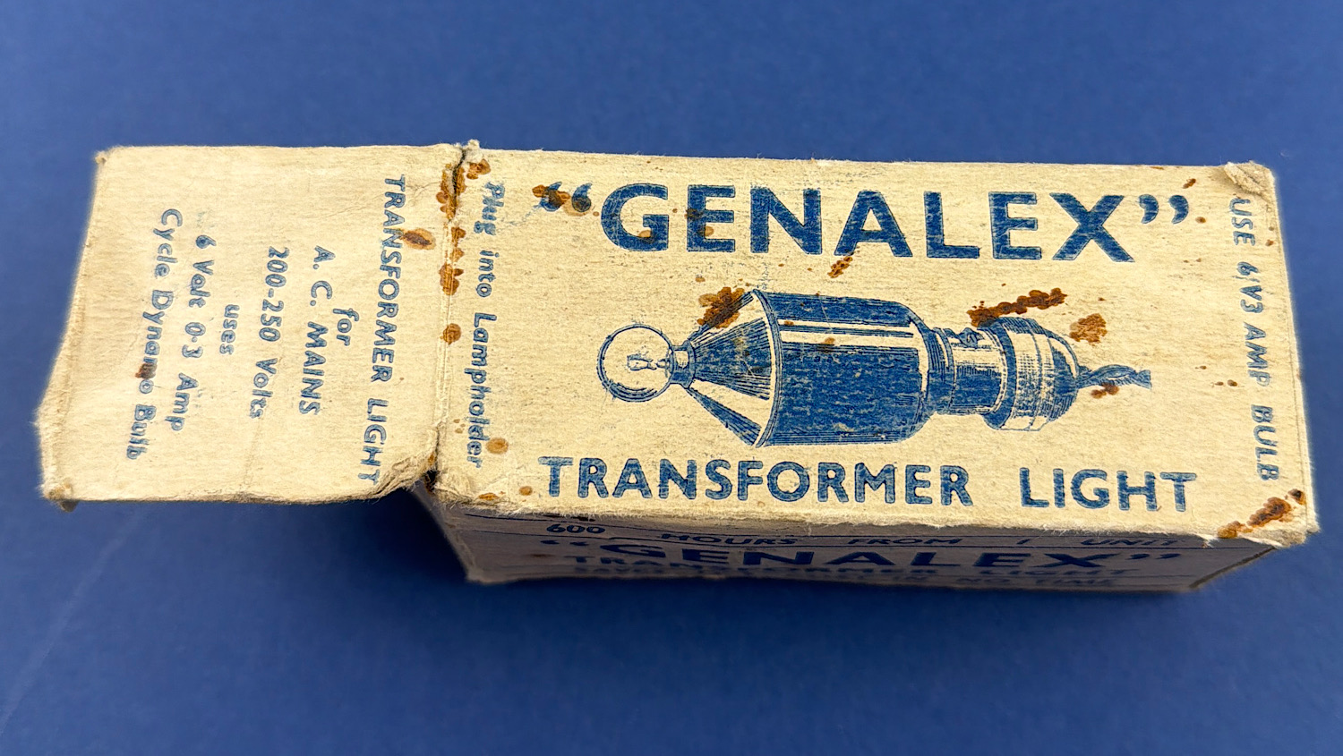 Original Genalex transformer light box showing the illustrated lamp design and original operating instructions for A.C. mains and 6V cycle dynamo bulbs.