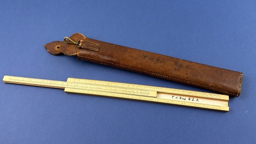 Original WW1 Royal Garrison Artillery named boxwood slide rule with 1916 dated broad arrow leather case.