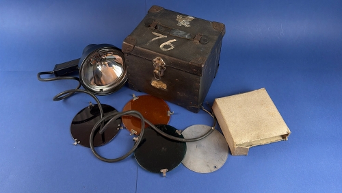 Original WW2 USAAF Grimes Model K-3 aircraft signal lamp set displayed with its original carrying case, four interchangeable coloured filters and cardboard accessory sleeve.
