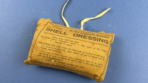 Original WW2 British Home Front ARP shell dressing dated February 1939, with Home Office Air Raid Precautions Department markings.